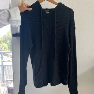 BleuSalt Black Top. Sweater feel with a hoodie design. Brand from Malibu, CA.